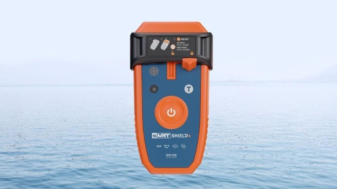 Wescom’s SMRT SHIELD+ personal locator beacon, orange with a blue face and a power button